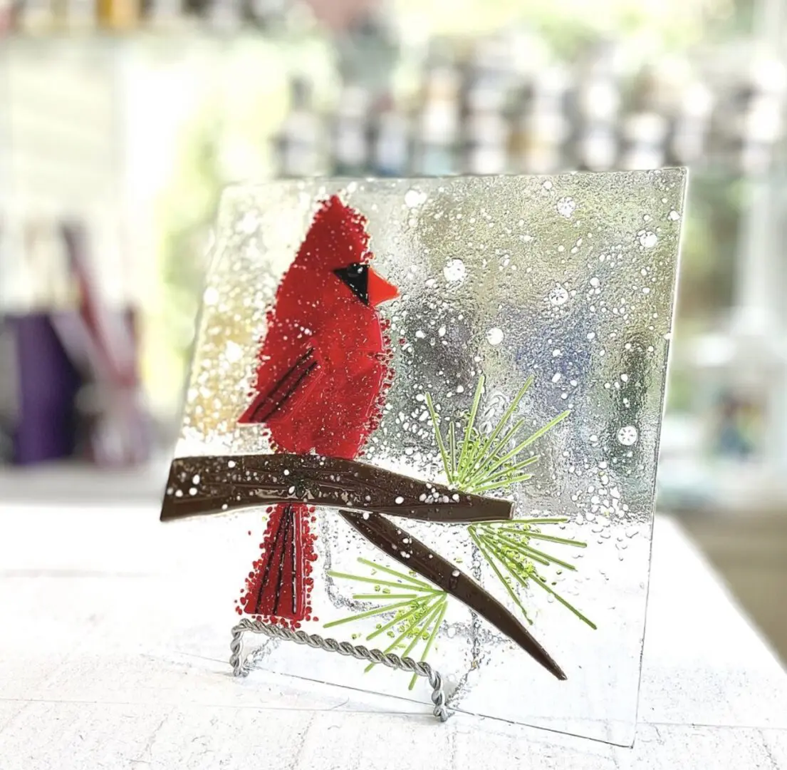fused glass with a bird design