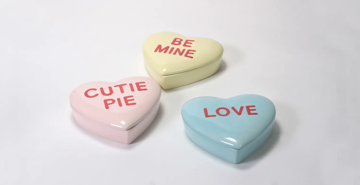 three heart-shaped candy boxes